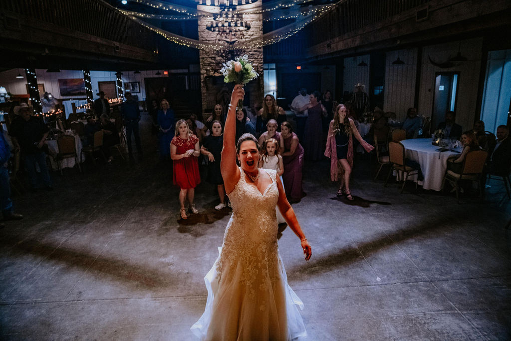 reunion ranch bride throwing bouquet